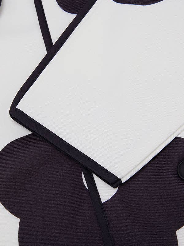 PRETO BRANCO Casaco de gola alta com manga longa, corte solto, estampa floral em cores contrastantes e abertura lateral para venda a revendedores na Faire13