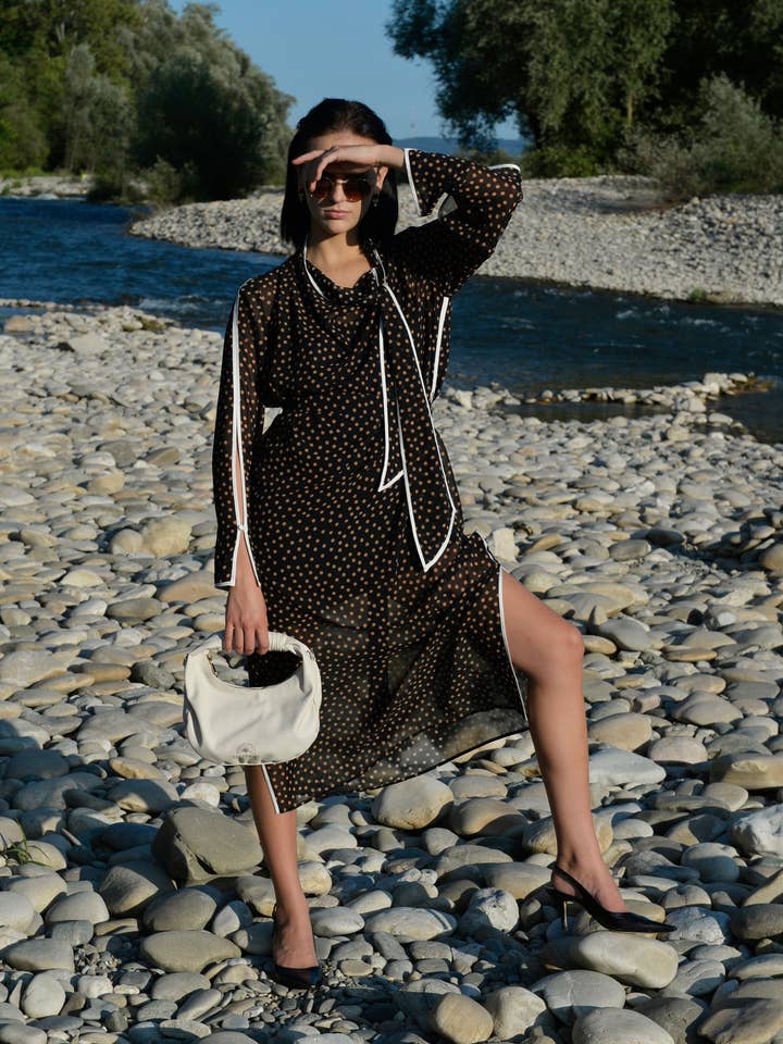 Sienna Crossbody Handbag made from recycled vegan material in Cream for wholesale by Ellefaire