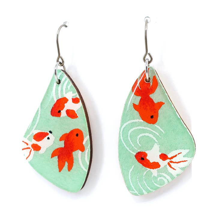 Mint green goldfish titanium dangle earrings for wholesale by autumn + tree
