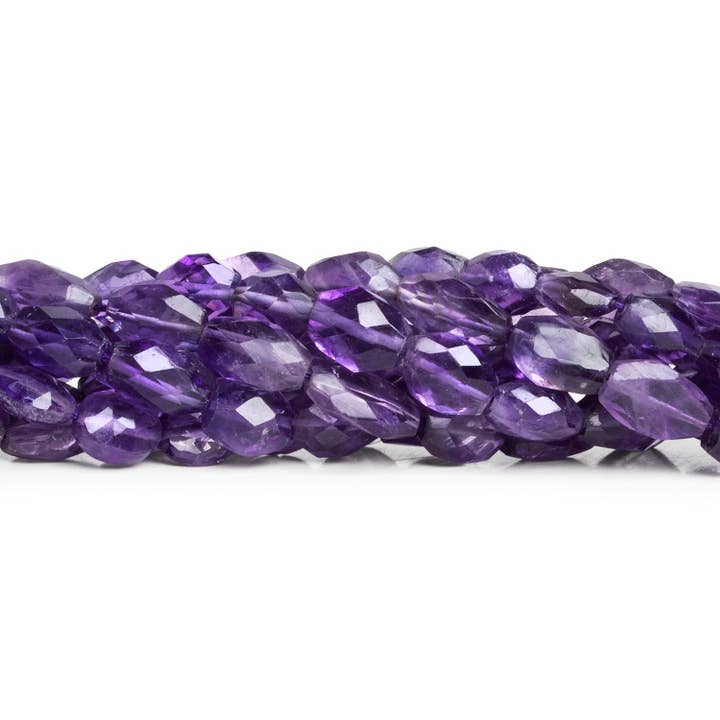 9x7mm African Amethyst Faceted Ovals 14 inch 39 beads for wholesale by The Bead Traders