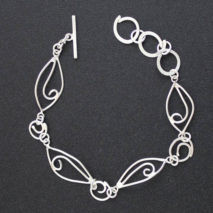 Bracciale Slinky Link in argento sterling per la vendita all'ingrosso da parte di Whitney Designs Ltd.