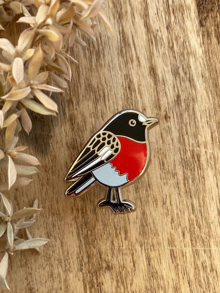 Scarlet Robin Enamel Pin for wholesale by PIGMENT MONICA REEVE