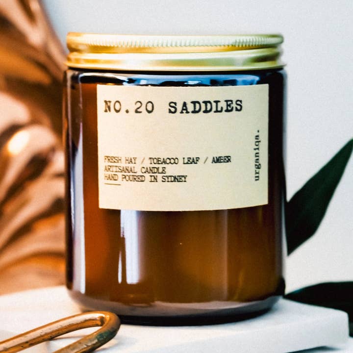 Saddles Scented Soy Candle | Ritual Collection and other Purchase Wholesale westerncarpet offcuts. Free Returns & Net 60 Terms on Faire trending on Faire.