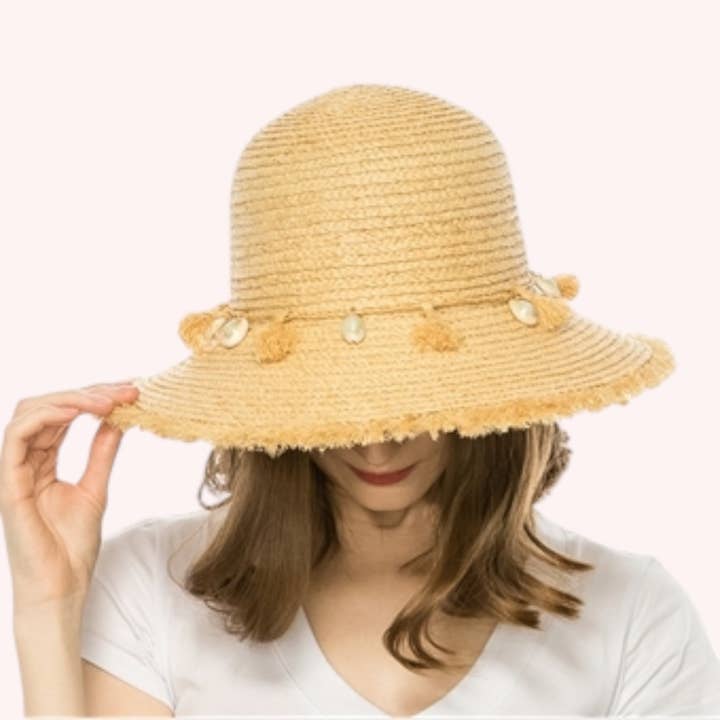 Raffia Fringe Bucket Hat w/ Shells – Handmade & Packable and other Purchase Wholesale raffia bucket hat. Free Returns & Net 60 Terms on Faire trending on Faire.