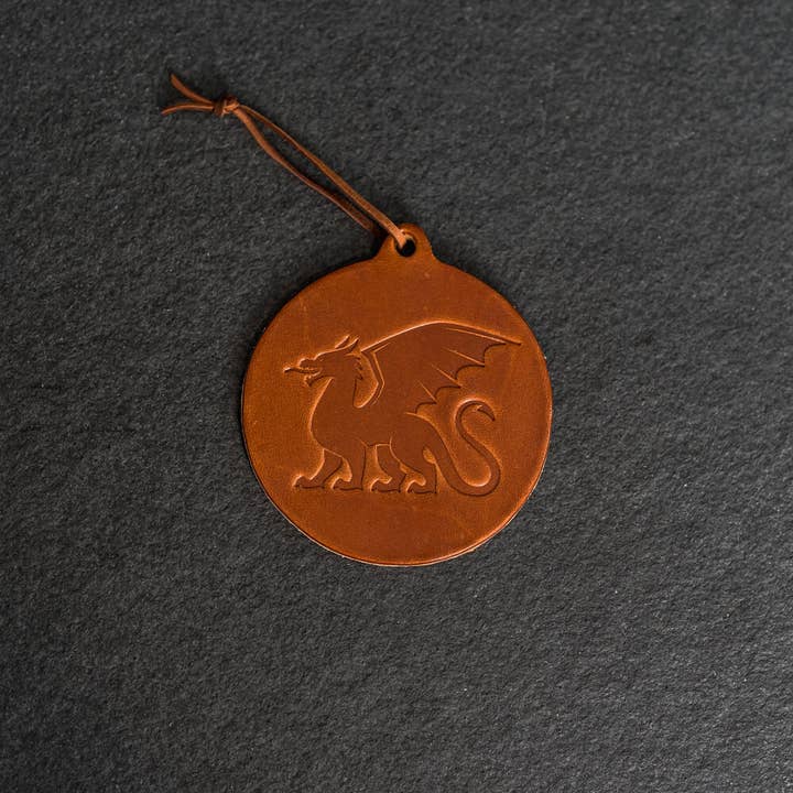 Dragon Circle Shape Leather Christmas Ornament | Stocking Tags for wholesale by Ox & Pine