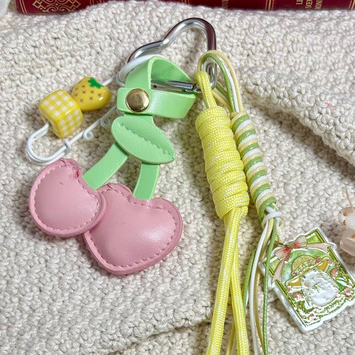 Yellow Bag charm and keychain Cerises PC28 for wholesale on Faire1