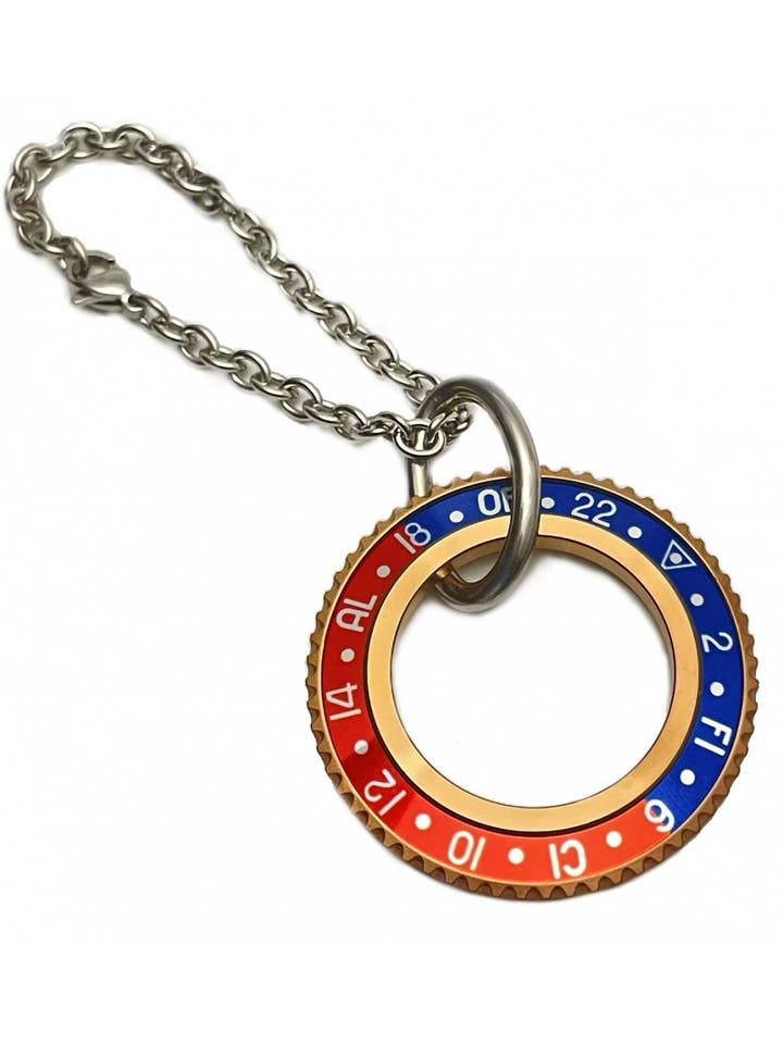 LLAVERO OFICIAL VELOCÍMETRO PVD BRONCE COLOR AZUL/ROJO para venta al por mayor de Speedometer Official