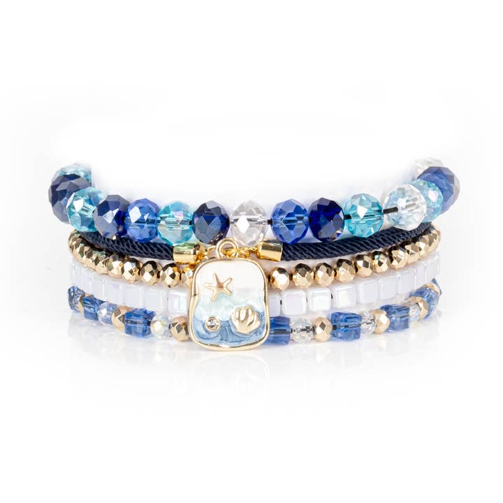 Ocean Crystal Stack Bracelet with Starfish & Shell Charm for wholesale by The Dark