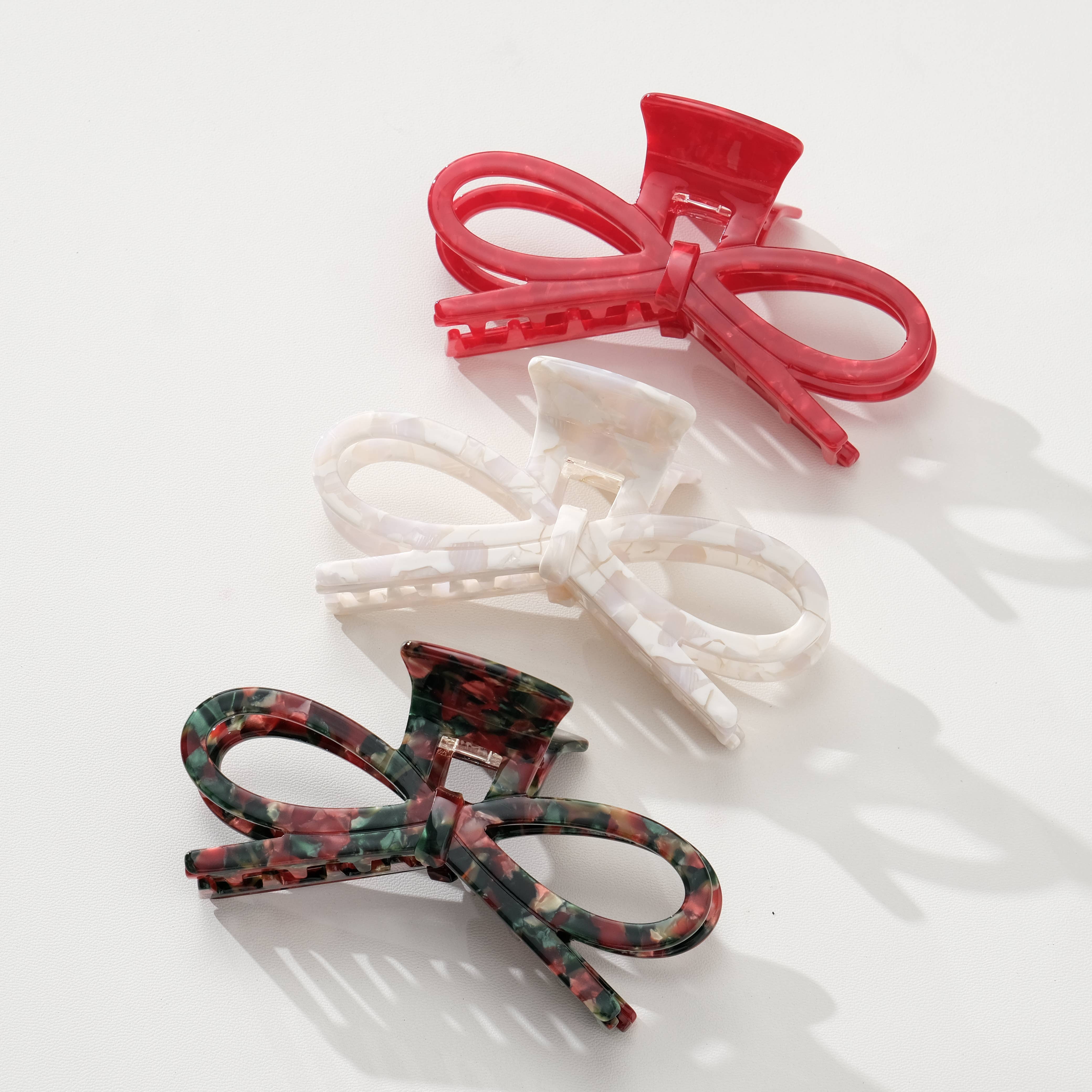Assorted Remi Vintage Holiday | Wide Bow Claw Clip for wholesale on Faire1