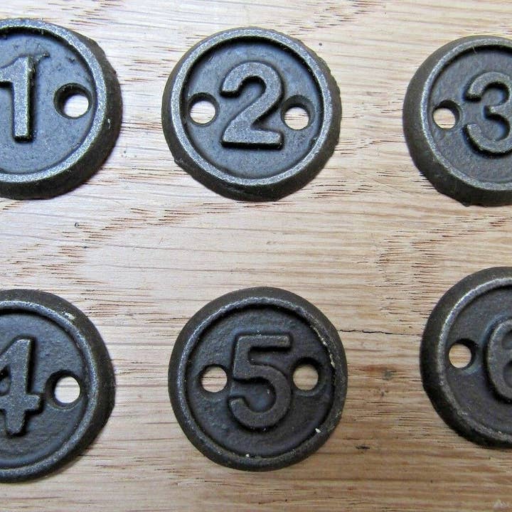 Cast Iron Numbered Disc Plaque 1-6 for wholesale by IronmongeryWorld