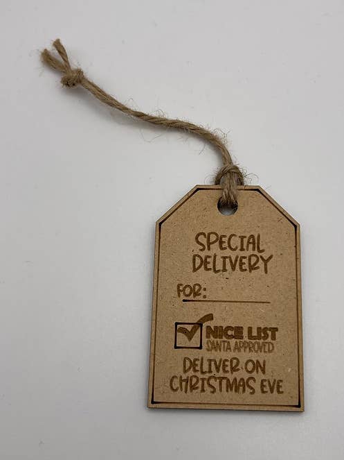 Special Delivery "Nice List" Tag for wholesale by Romika Designs