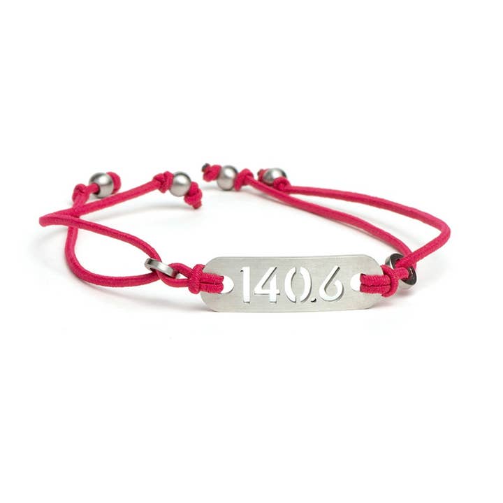 ATHLETE INSPIRED, Inc. - Vendita all'ingrosso Bracciale in tessuto/intrecciato - 140.6 Bracciale da triathlon a distanza di ferro rosa o nero - cravatta elasticizzata regolabile