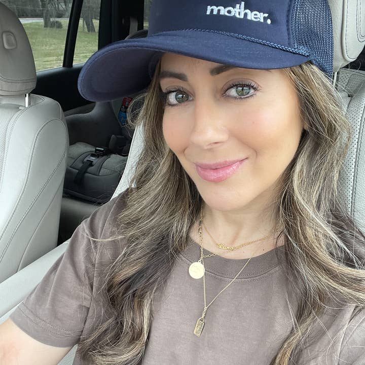 The Mini Mother Embroidered Women's Trucker Hat - Navy for wholesale on Faire