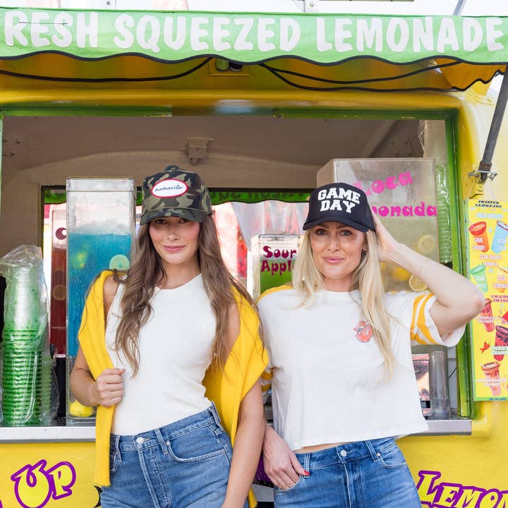 Black Mamacita Trucker Hat in Camo for wholesale on Faire2