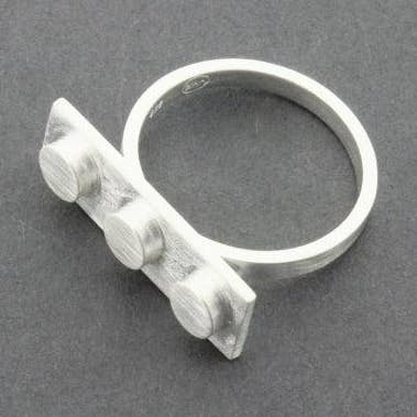 Lego-ring van sterling zilver voor wholesale door Makers & Providers
