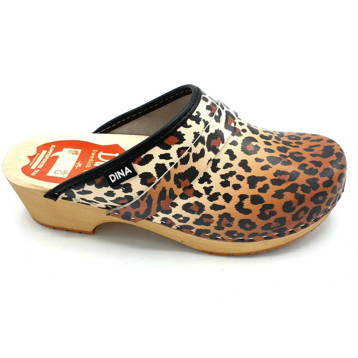 Zoccoli in pelle DINA con fantasia pantera per la vendita all'ingrosso da parte di TRAAGOODS.COM