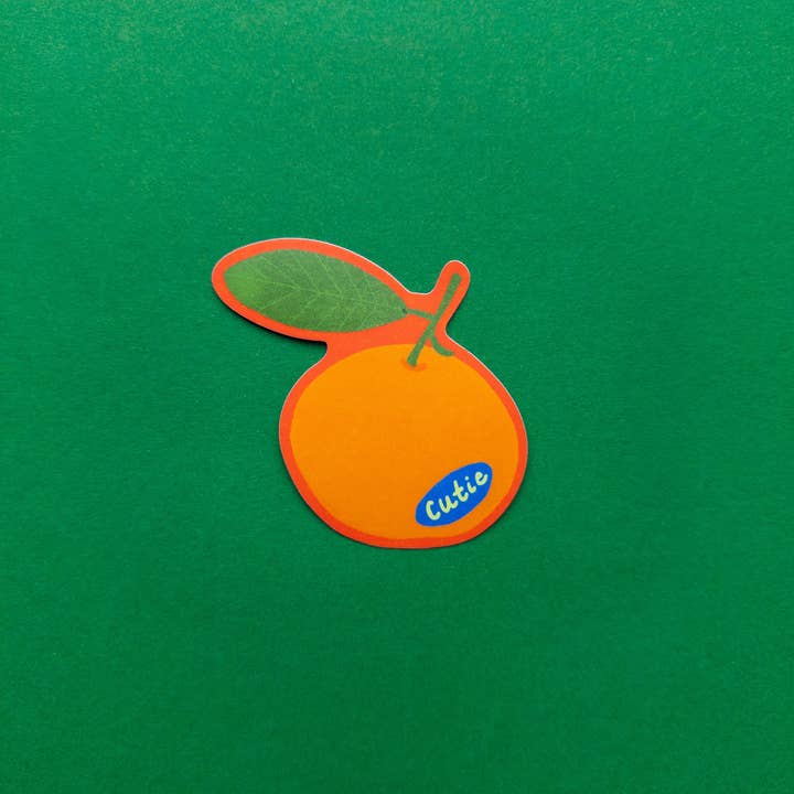 Lil' Cutie Mandarin Sticker for wholesale by Mel Andrel