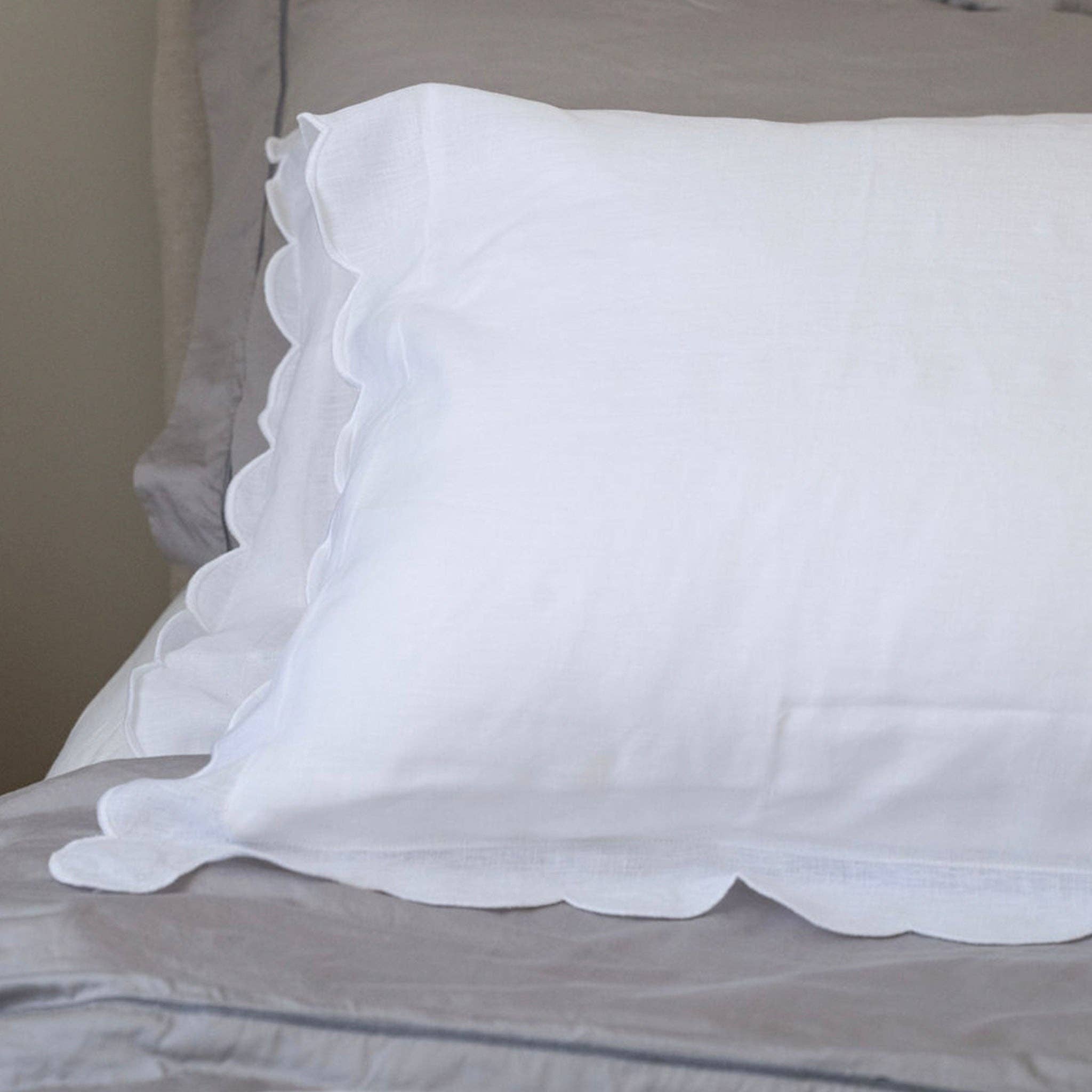 White Scalloped Edge Linen Pillowcases for wholesale on Faire2