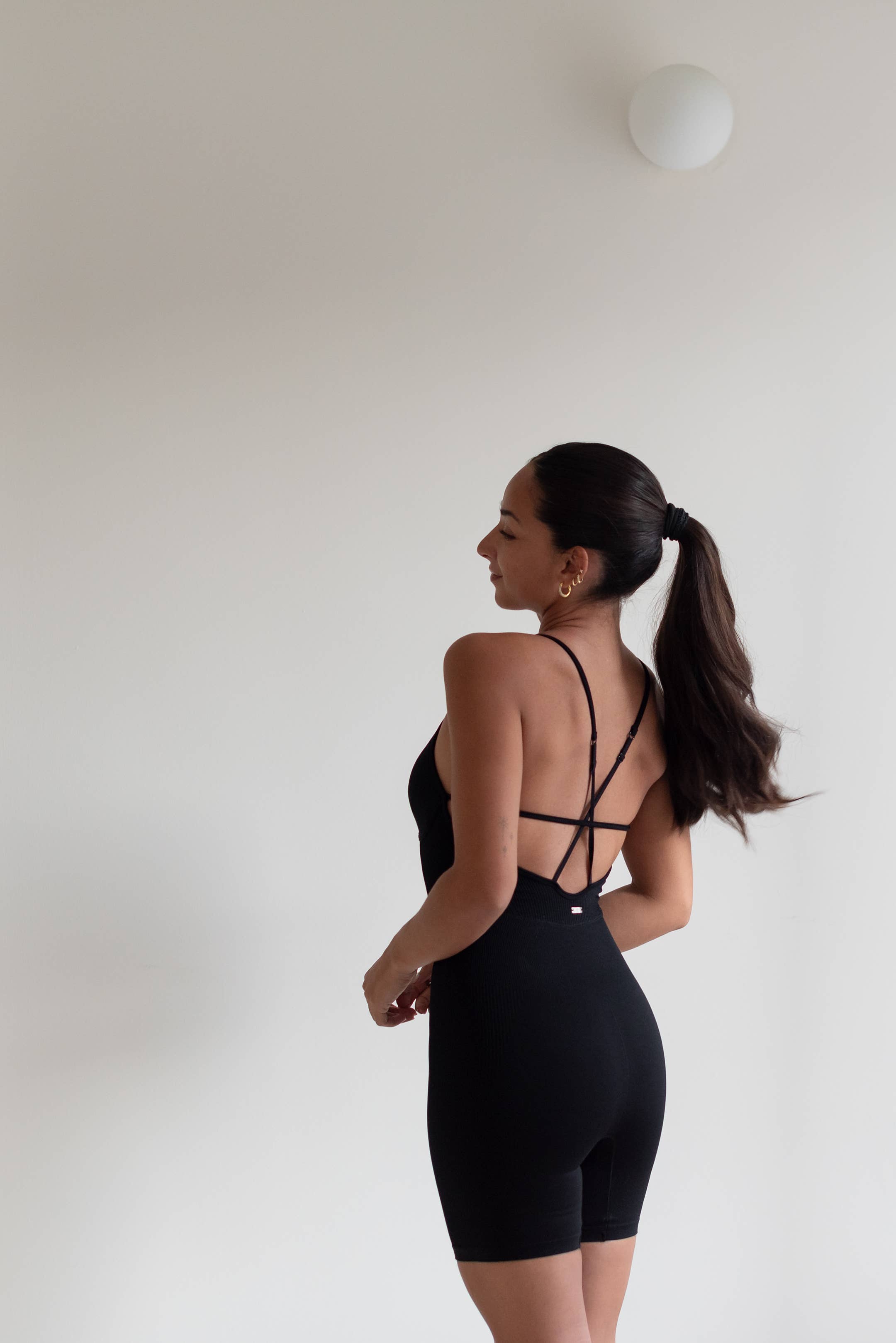 Nero Tuta Starlight nera con corpo stile corsetto in vendita all'ingrosso su Faire9