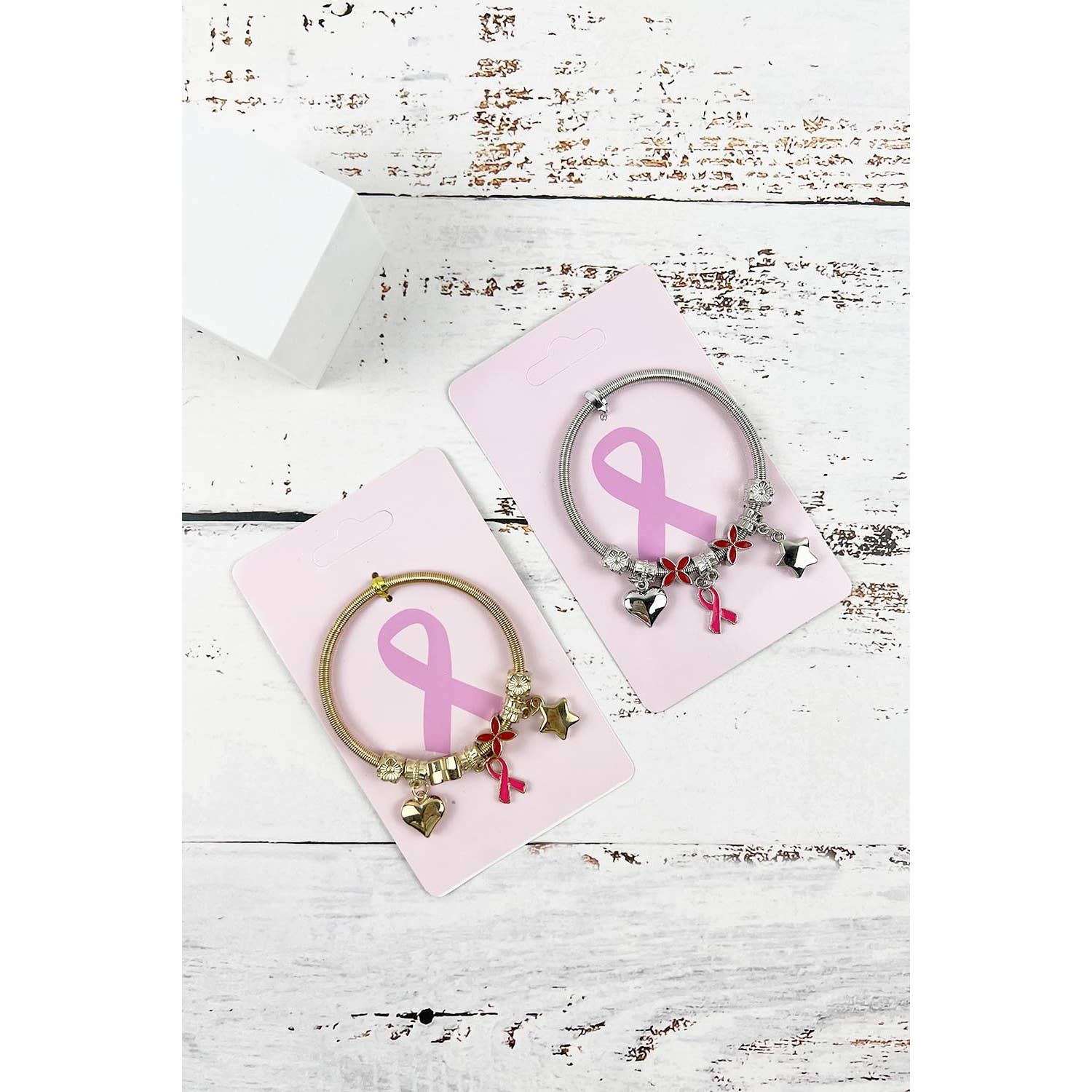 ASSORTED BREAST CANCER AWARENESS PINK RIBBON CHARM BANGLE BRACELET for wholesale on Faire4