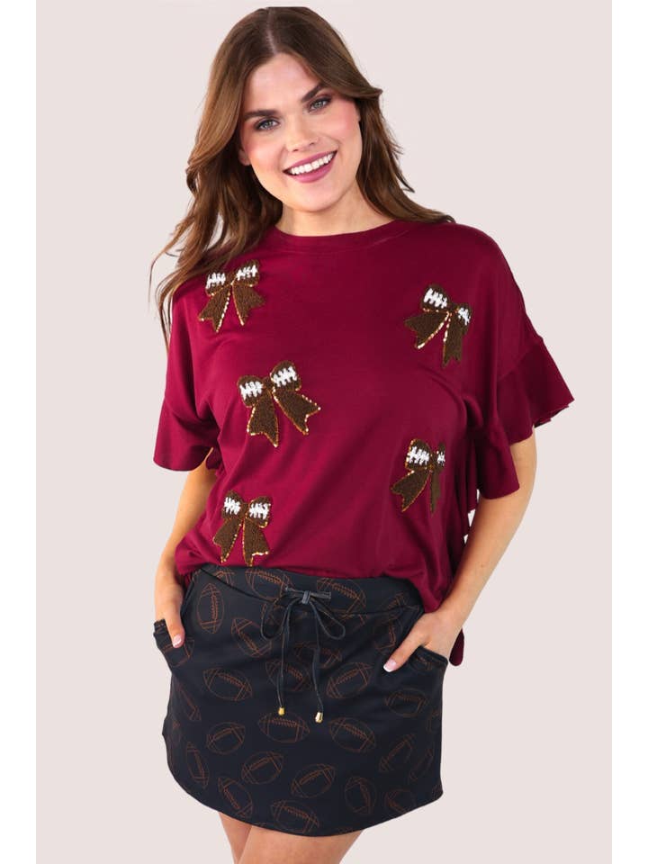 Sideline Sparkle Ruffle Top- Maroon for wholesale on Faire7