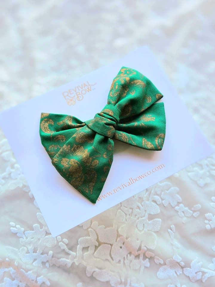 Large Pinwheel Bow on Clip • Gilded Green for wholesale by Revival Bow Co.