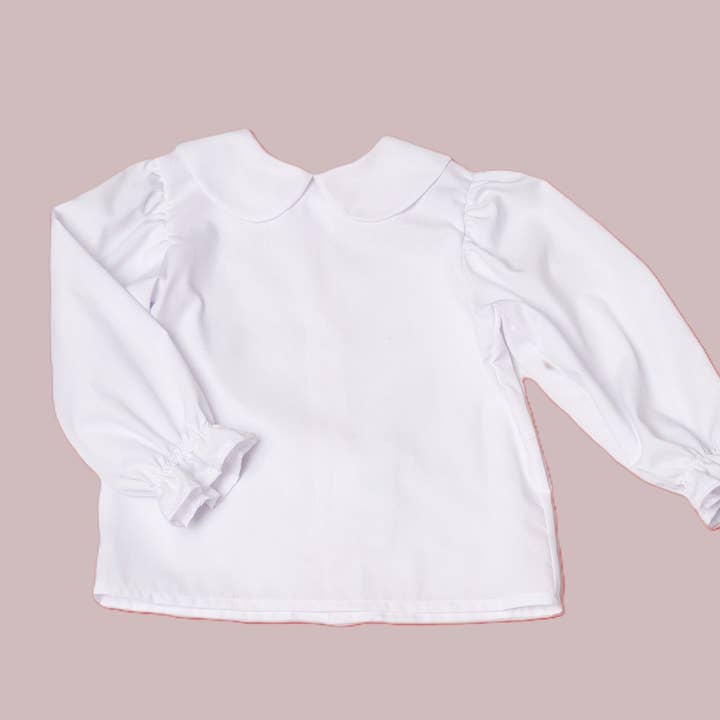 Blusa bianca a maniche lunghe per ragazze Alice in batista imperiale facile da curare per la vendita all'ingrosso da parte di Angels and Company Clothing