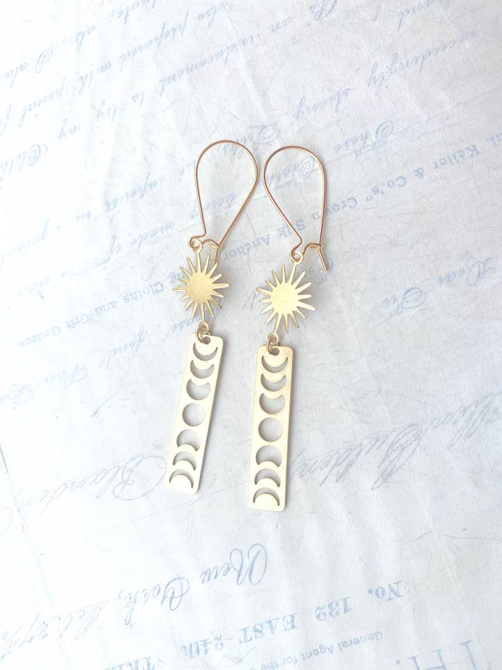 Star & Moon Phase Bar Earrings Gold Starburst Celestial for wholesale by Red Truck Designs