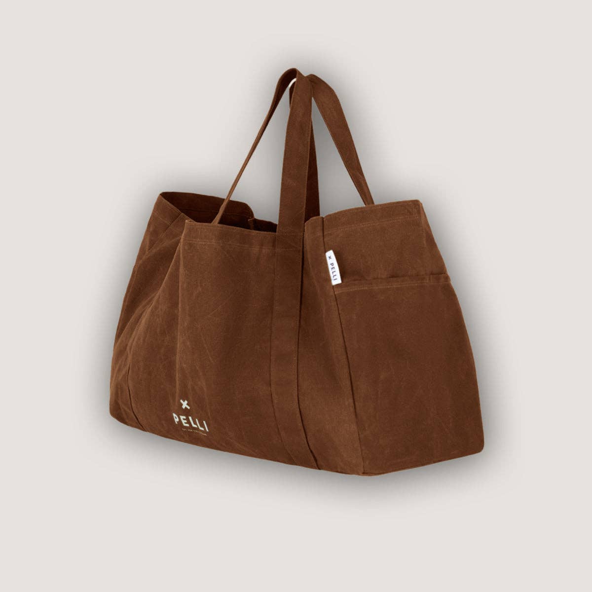 Beachy Keen Waxed Canvas Beach Bag - Chai Tea for wholesale on Faire
