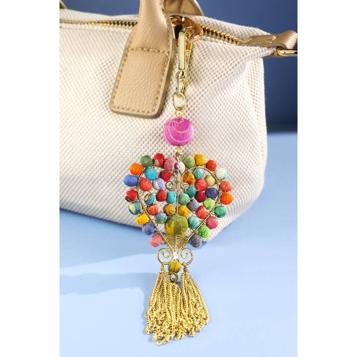 Handmade Wrapped Beaded Heart Keychain for wholesale on Faire1