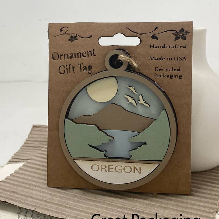 Pine Designs - Wholesale Ornament - Any CityState or CustomText Mountains w Creek Ornament