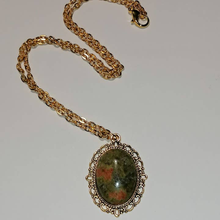 Pendentif doré vert orangé pour la vente par Blue Moon Bijoux