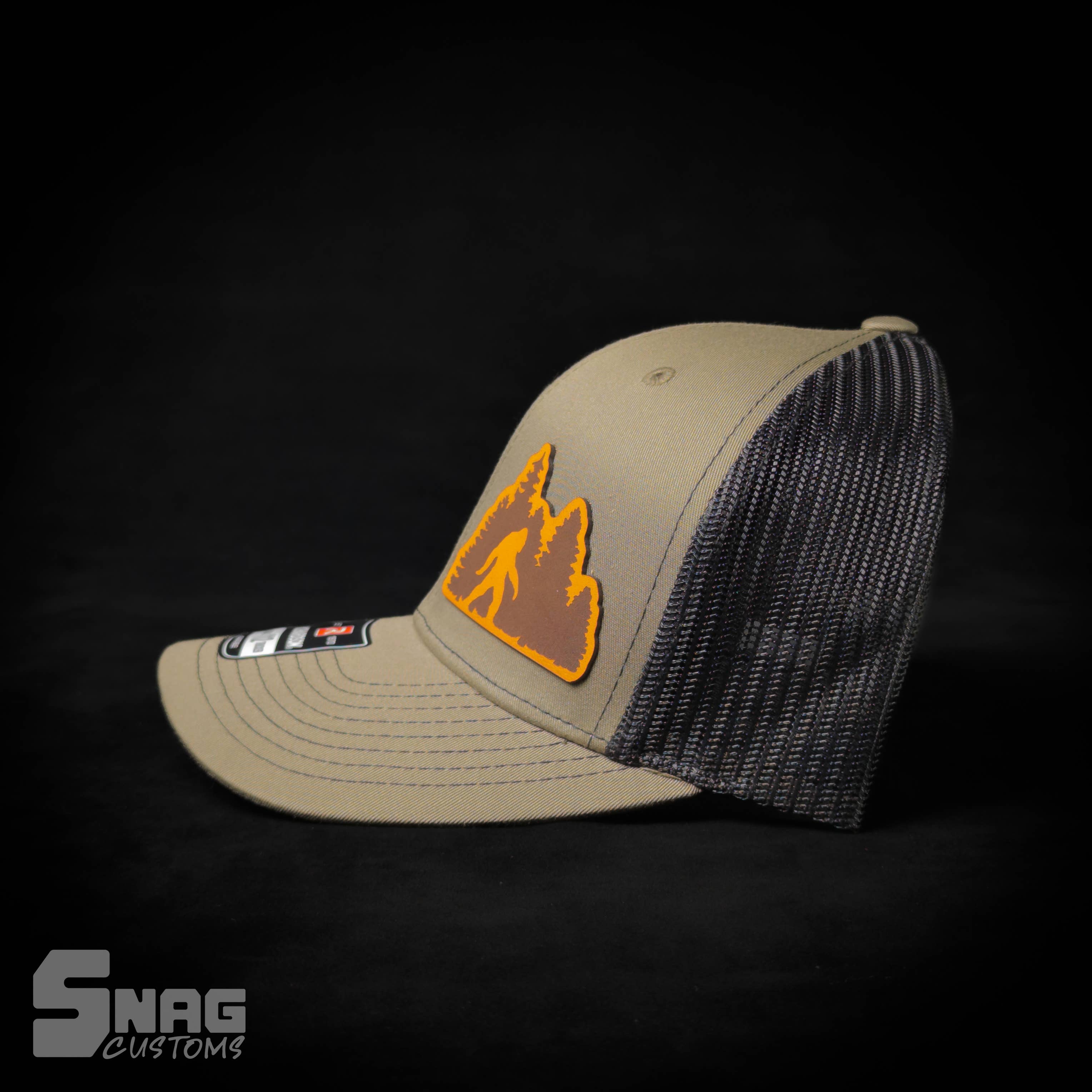 Snag Customs - Wholesale Trucker Hat - Unisex - Woods/Forest Sasquatch, Yeti, Bigfoot Leather Patch Hat1