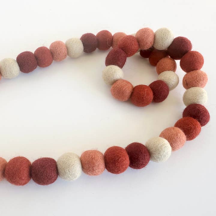 Reds Ombre Felt Ball Garland for wholesale by Wool Jamboree