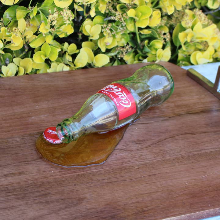 Fake Spilled Coke Bottle for wholesale by Just Dough It! Fake Foods