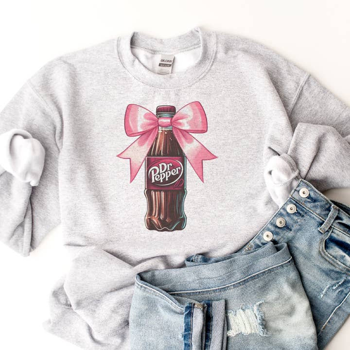 Par.tees by Party On! - Wholesale Graphic Sweatshirt - Women's - Coquette Dr. Pepper Pink Bow Soda Bottle Graphic Sweatshirt