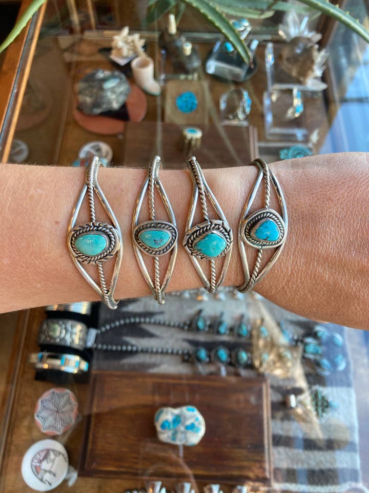 Vintage Blue Turquoise Southwestern Navajo Signed Concho for wholesale by Rainbow Trading Post