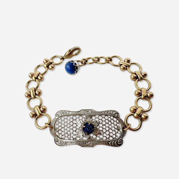 Repurposed antique oval silver mesh bracelet with blue rhinestone centerpiece for wholesale by Lulu’s Petals