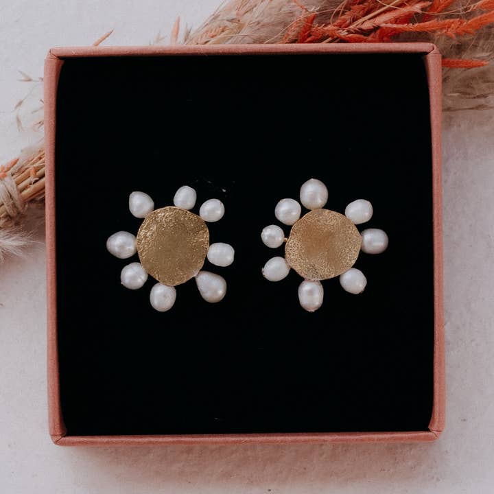 Blomsterteksturernes Øreringe for engroshandel hos Maria rosua