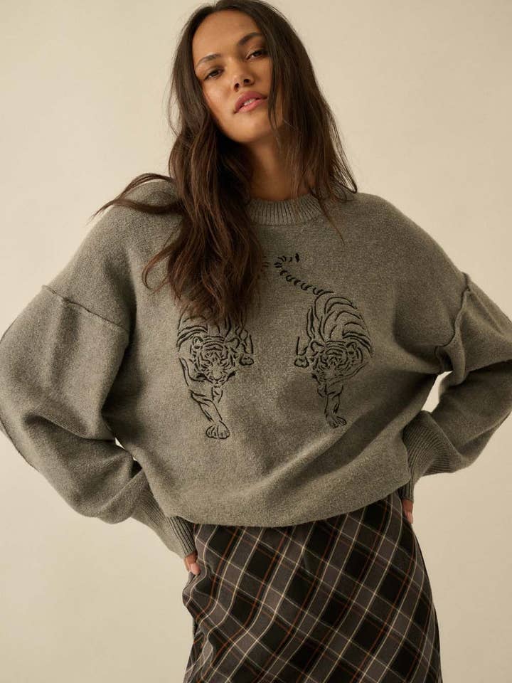 Embroidered Tigers Solid Knit Exposed-Seam Sweater and other Purchase Wholesale cat sweater. Free Returns & Net 60 Terms on Faire trending on Faire.