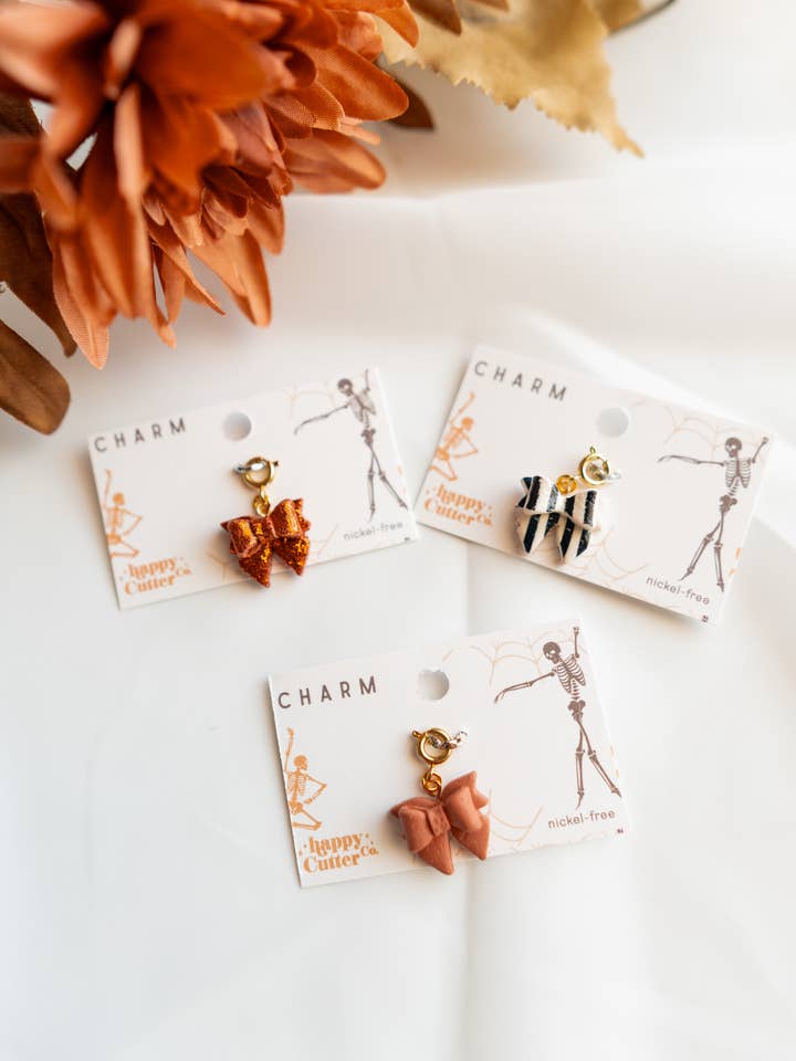 Halloween Bow Charms | Glitter Orange Striped Bow Coquette for wholesale by Happy Cutter Co