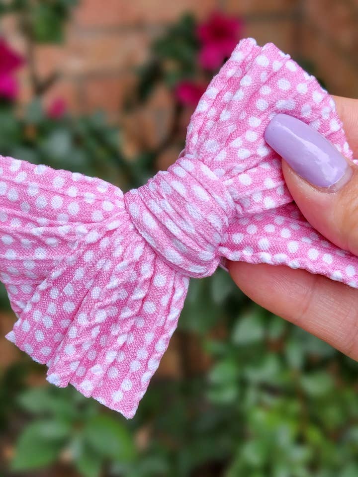 Daisy Bow-Polka Dot Pink for wholesale by Dainty Delights Creations