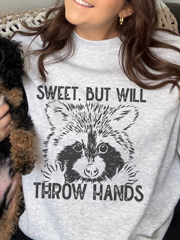 Raccoon Throw Hands for wholesale by The Wild Buck Company