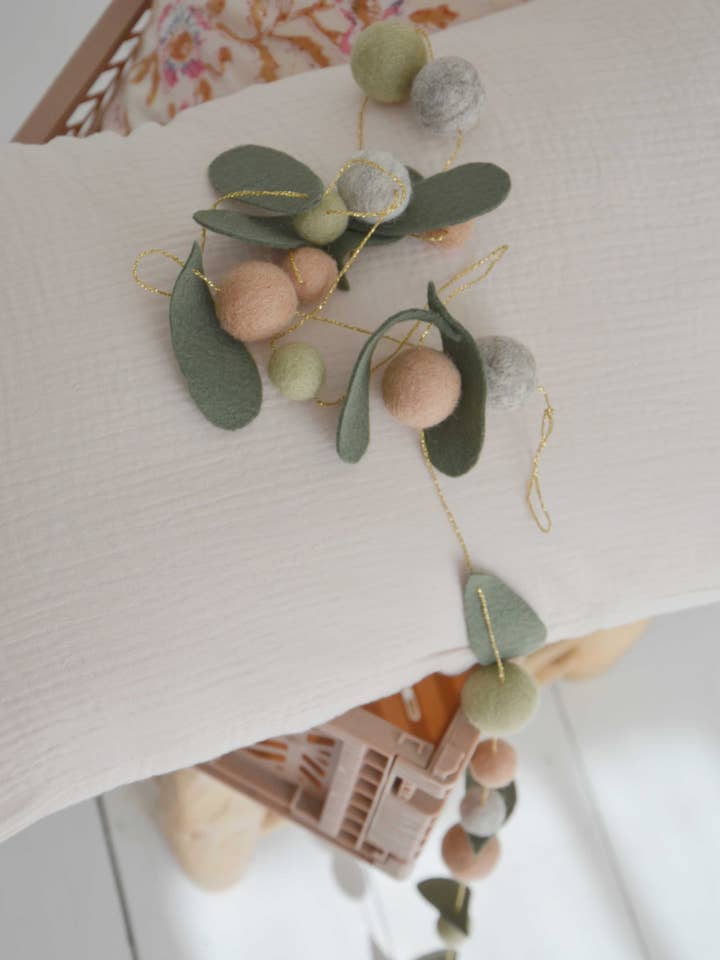 Felted wool ball garland and merino leaves for wholesale by Calmfordreamers