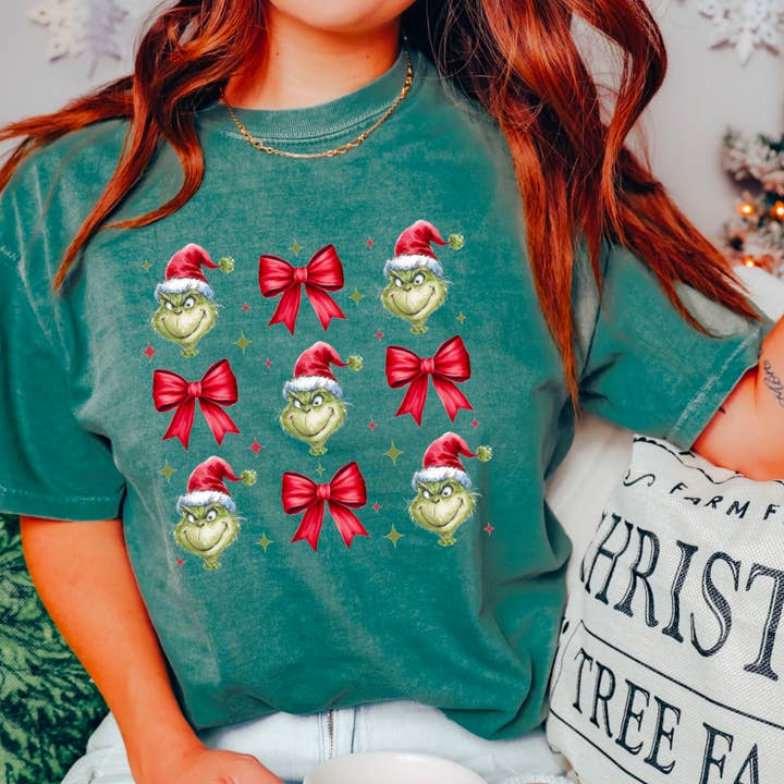 Grinch Coquette Bows Graphic Tee Christmas for wholesale by Gia Gifts Boutique