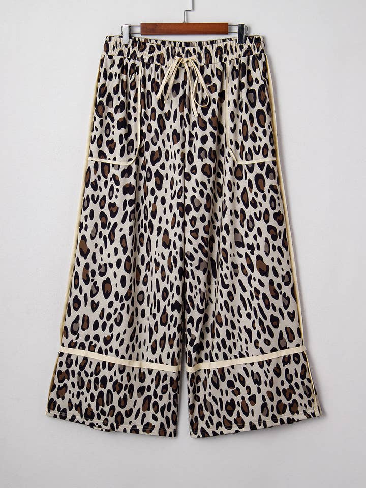 Khaki Exposed Seam Patched Pocket Plus Size Drawstring Leopard Wide Leg Pants and other Purchase Wholesale plus size pants. Free Returns & Net 60 Terms on Faire trending on Faire.