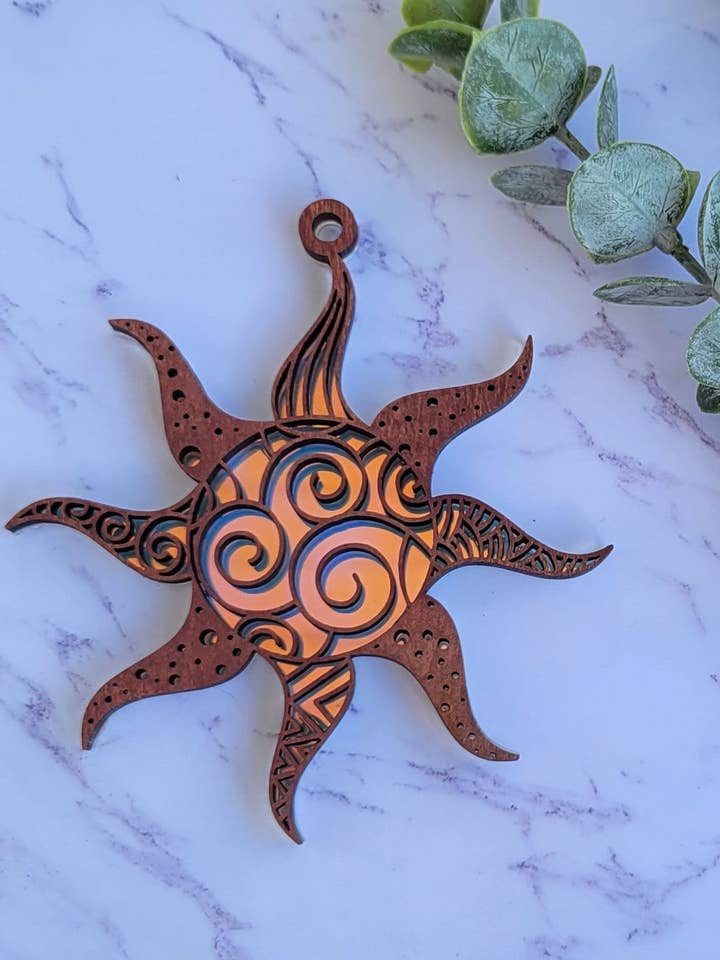 Iridescent Sun Mandala Suncatcher - Crystal Acrylic Suncatcher - Witchy Cottagecore Plant Decor - Window Light Sun Catcher for wholesale by Shelfish Modern