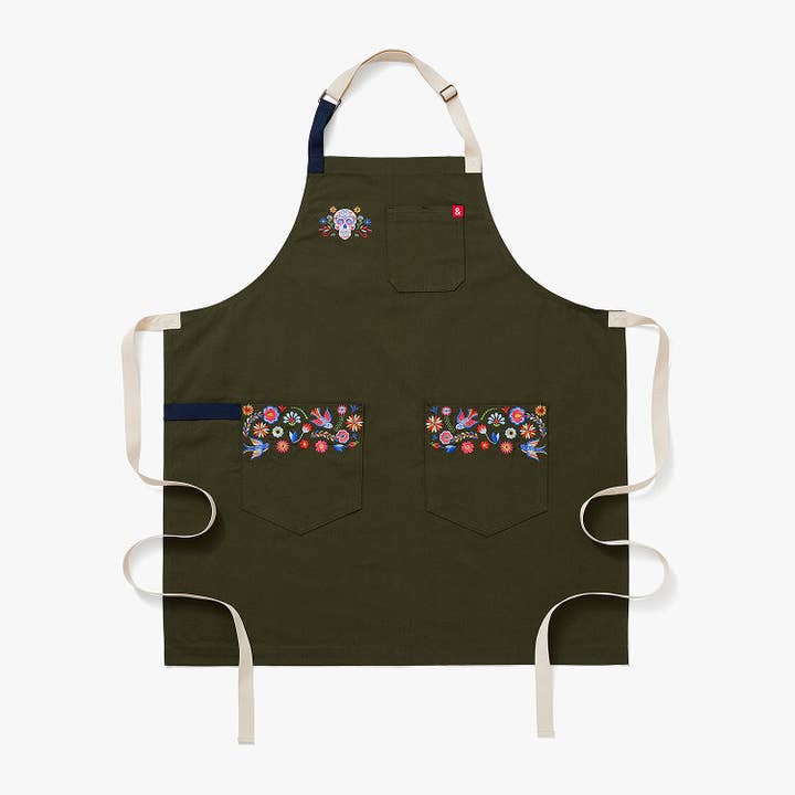 The Limited Edition Essential Apron - Dia de los Muertos and other Purchase Wholesale dia los muertos. Free Returns & Net 60 Terms on Faire trending on Faire.