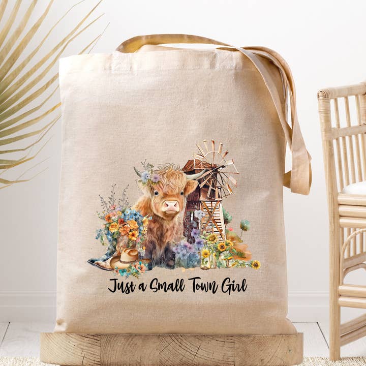 Bolsa de lona Just A Small Time Girl, diseño de Highland Cow para venta al por mayor de Dark Horse Dream Designs LLC