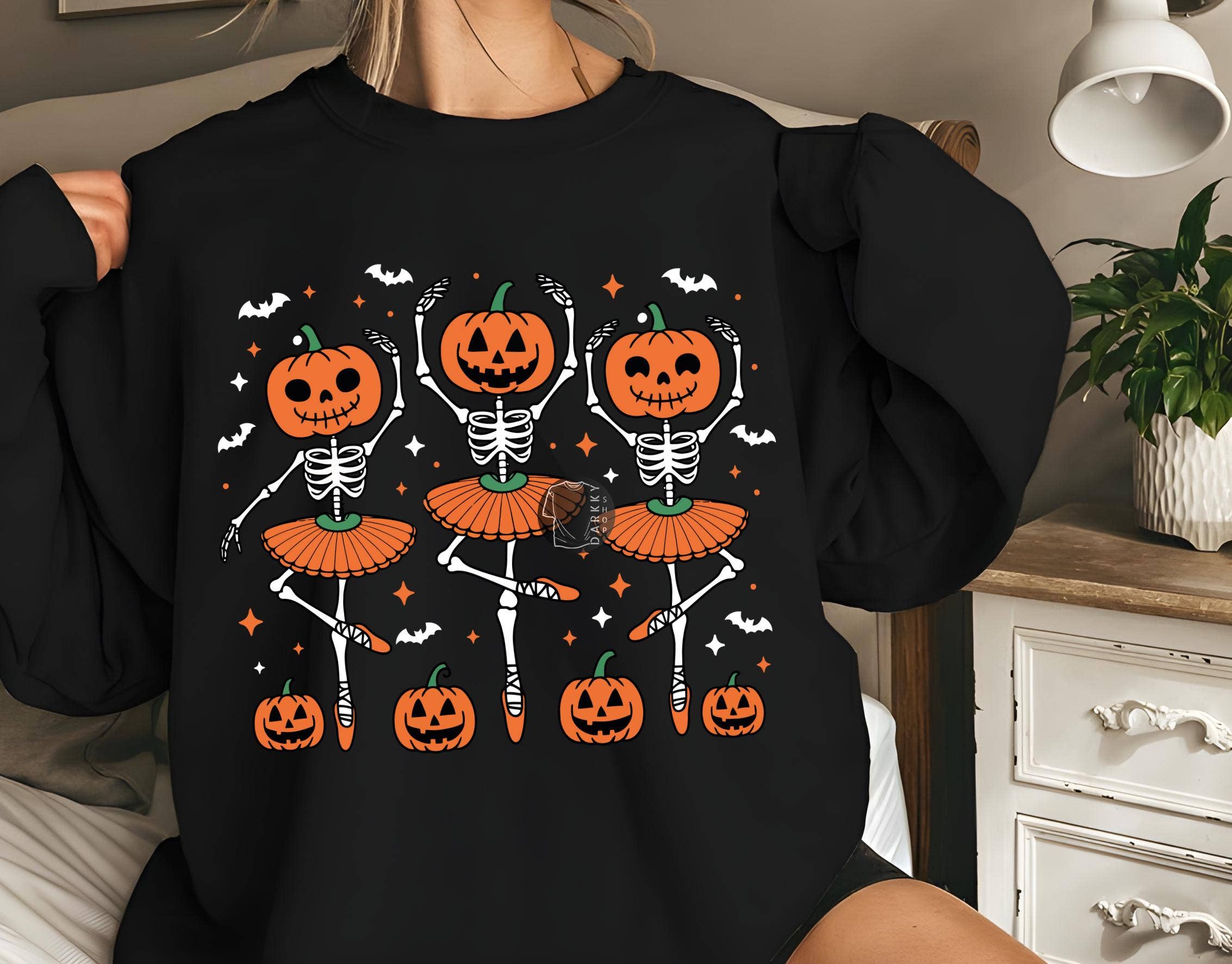 NVC Ecommerce LLC - Wholesale T-Shirt (Graphic) - Women's - Ballet Dancing Skeleton Tee, Halloween Pumpkin Sweater2